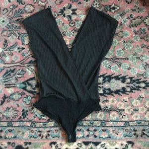 Sleeveless deep V bodysuit